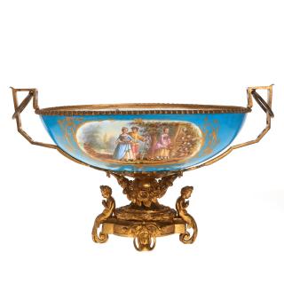 Appraisal: Sevres style ormolu mounted porcelain center bowl Sevres style ormolu