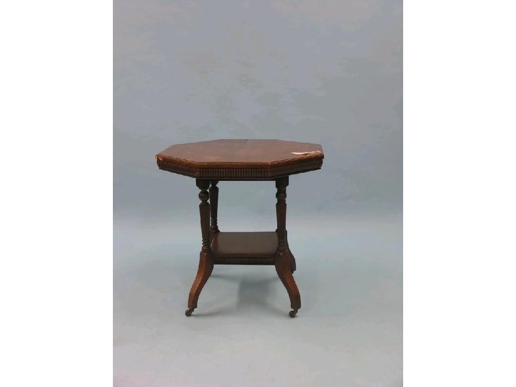 Appraisal: A late Victorian walnut occasional table octagonal top on four