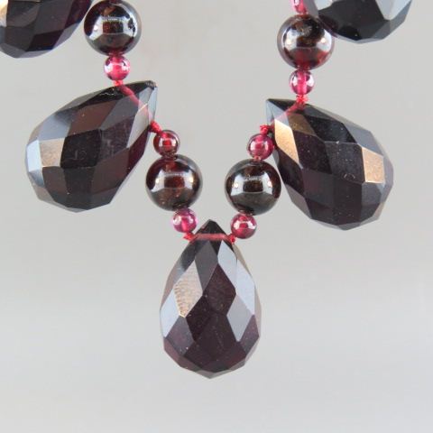 Appraisal: Garnet Necklace faceted teardrop briolettes and bead design sterling clasp