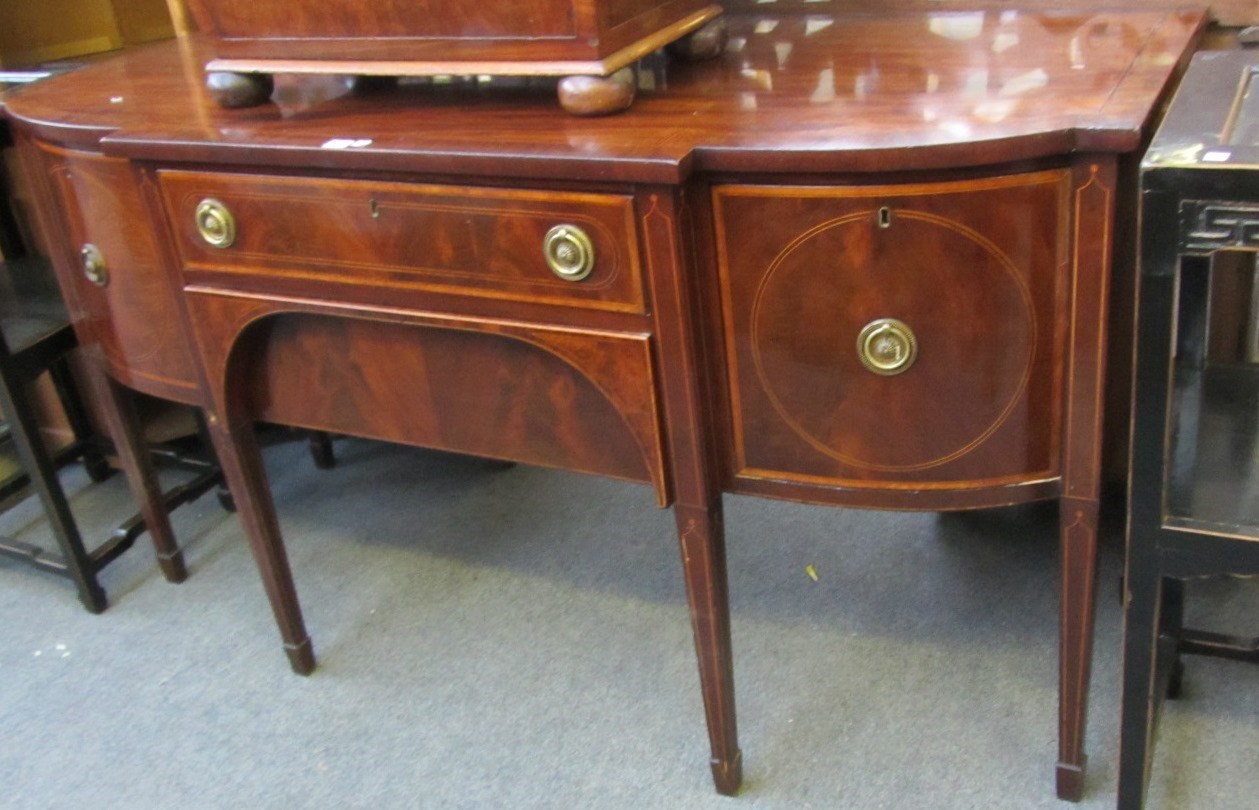 Appraisal: A George III inlaid mahogany Scottish breakfront sideboard on tapering