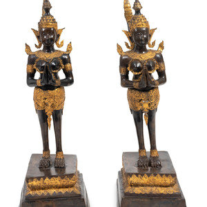 Appraisal: A Pair of Thai Parcel Gilt and Patinated Bronze Mythical