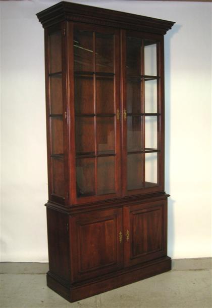 Appraisal: Cherry china cabinet th century with two glass doors enclosing