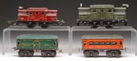 Appraisal: LOT OF FOUR IVES O GAUGE LOCOS AND CARS Includes