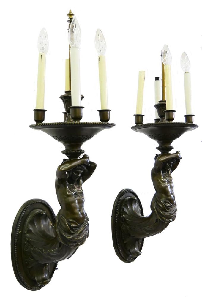 Appraisal: Pr MID CENTURY BRONZE SHIP FIGUREHEAD WALL SCONCES A pair