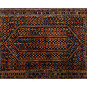 Appraisal: A Persian Wool Rug th Century feet inches x feet