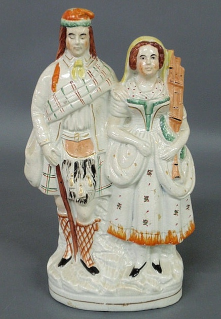 Appraisal: Staffordshire Scottish figural group of a huntsman and wife c