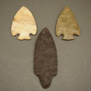 Appraisal: flint spear arrowheads Three flint spear and arrowheads Including arrowheads