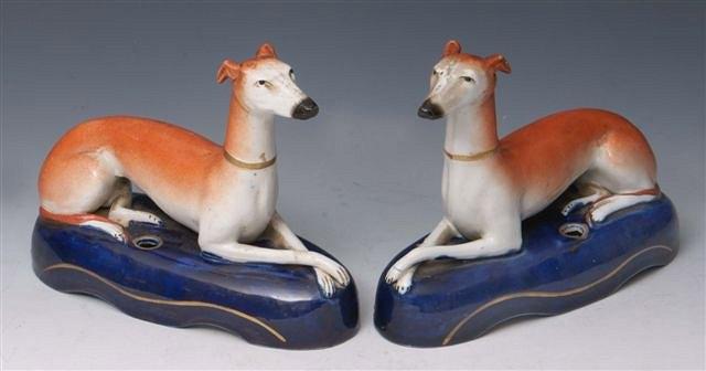 Appraisal: A PAIR OF TH CENTURY STAFFORDSHIRE PEN HOLDERS each in