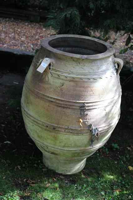 Appraisal: A LARGE PAIR OF TERRACOTTA OVOID PLANTERS each with three