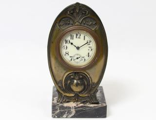 Appraisal: ART NOUVEAU STYLE METAL DESK CLOCK American th Century On