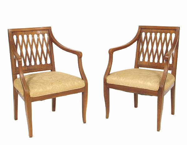 Appraisal: A pair of Continental fruitwood armchairs height in width in