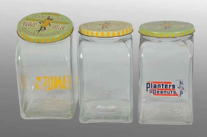 Appraisal: Lot of Assorted Planters Peanut Jars Description s to s