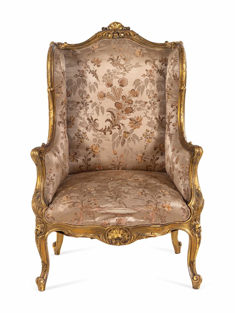 Appraisal: A Louis XV Style Giltwood Bergere aOreilles A Louis XV