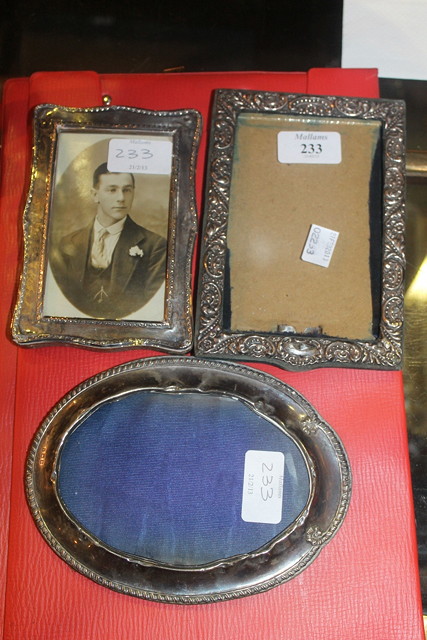 Appraisal: A COLLECTION OF THREE SILVER PHOTOGRAPH FRAMES of various forms