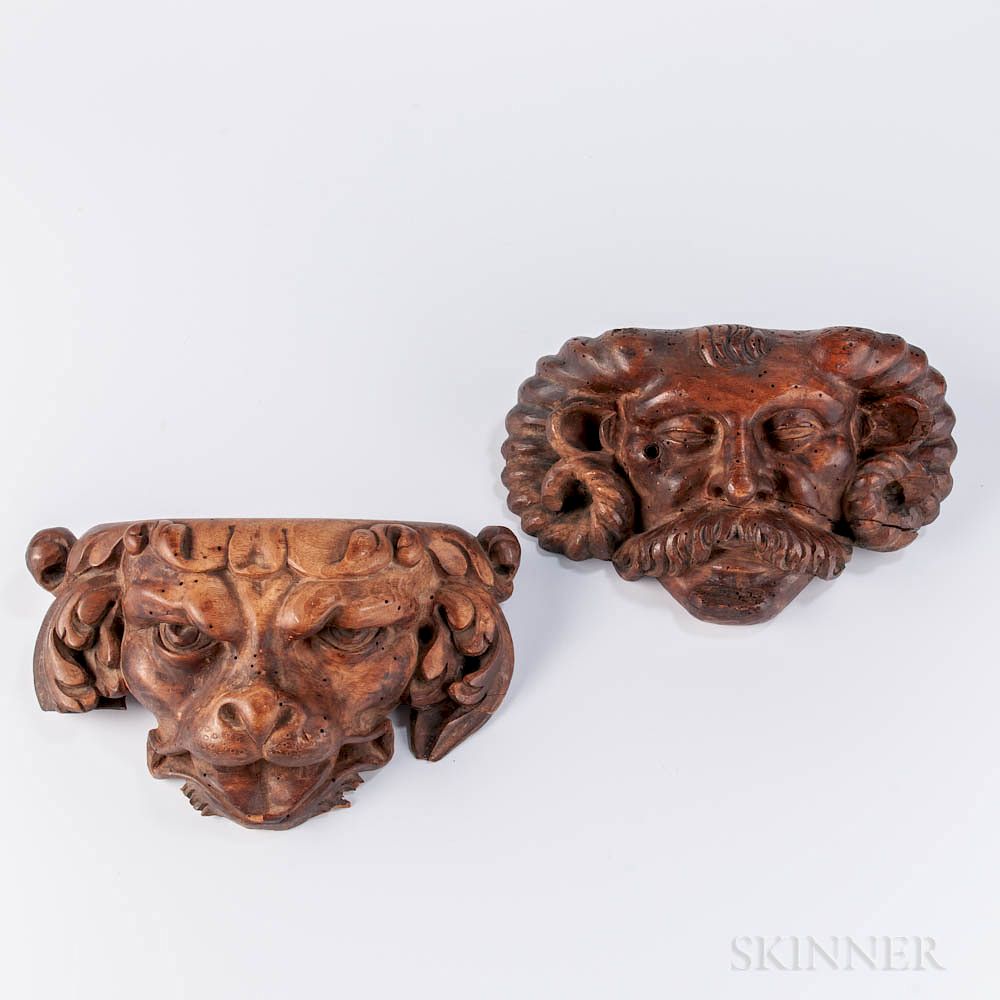 Appraisal: Pair of Carved Walnut Masks Pair of Carved Walnut Masks