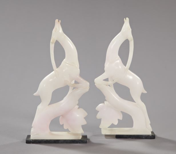 Appraisal: Pair of Italian Art Deco Carved Pale Pink Alabaster Figures