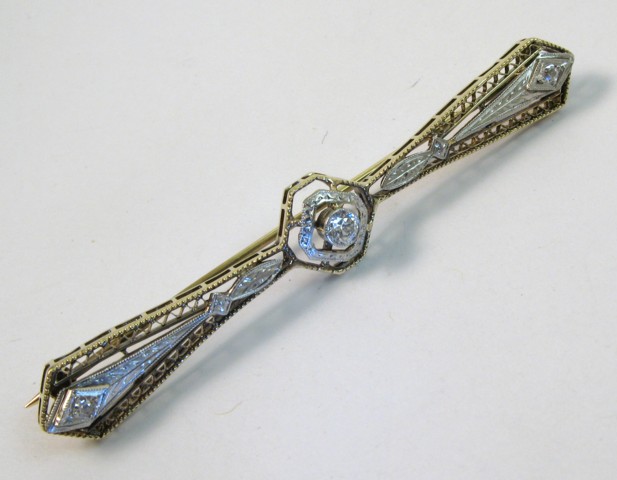 Appraisal: DIAMOND AND GOLD PIN - in length and set with