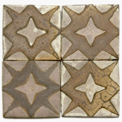 Appraisal: GRUEBY Fifty-three geometric tiles with a raised star pattern in