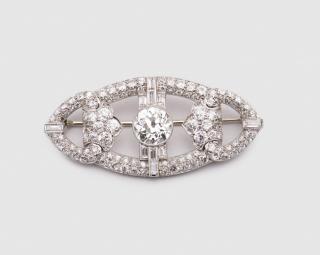 Appraisal: Platinum and Diamond Brooch PLATINUM AND DIAMOND BROOCHcentering a bezel-set