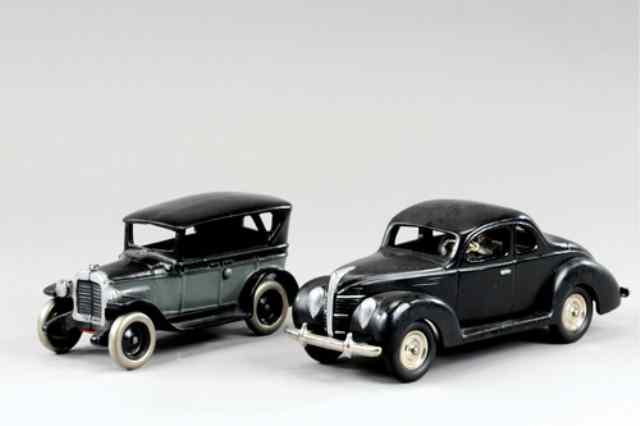 Appraisal: CONTEMPORARY FORD COUPE AND BUICK Cast iron painted in black