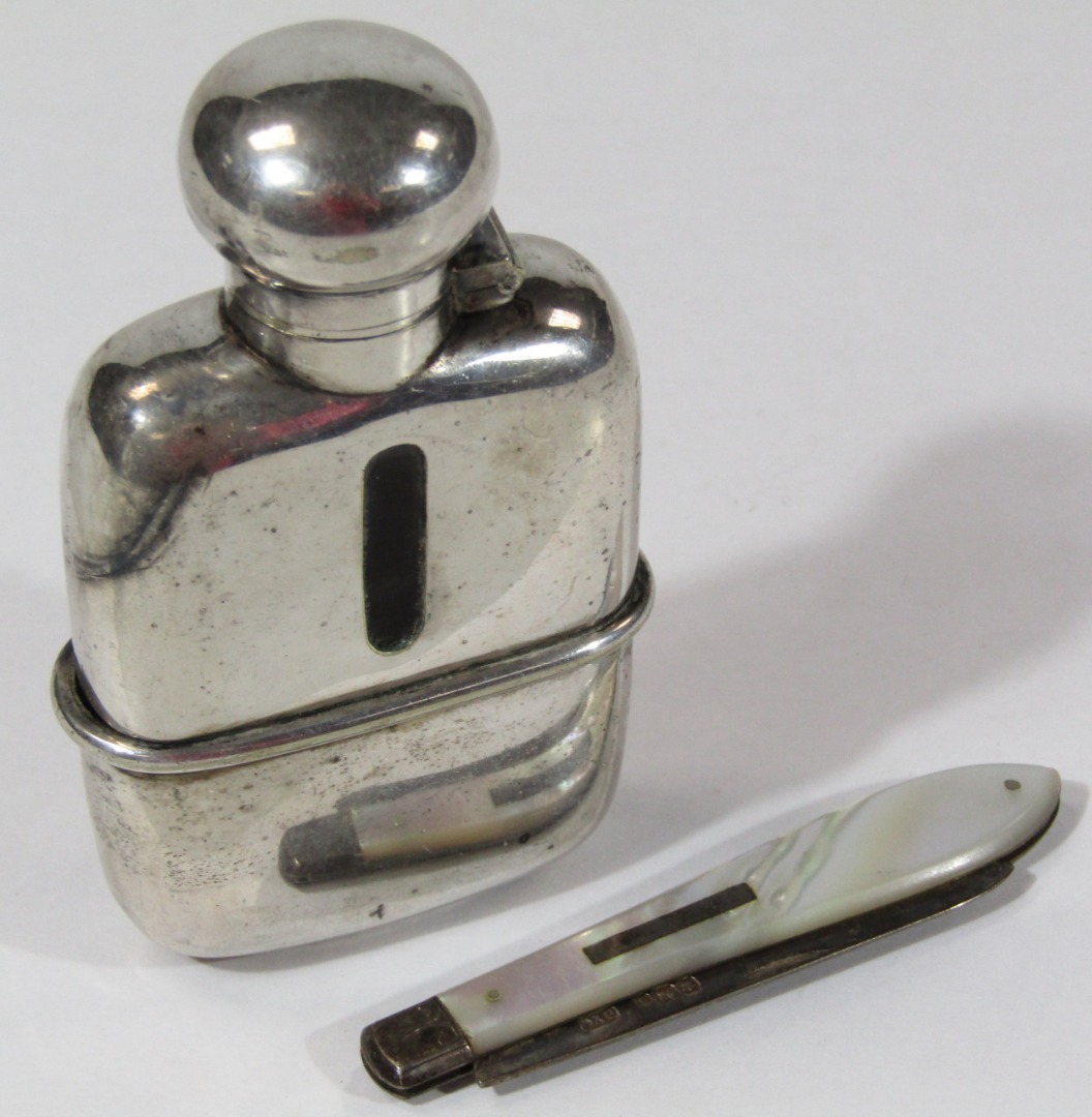 Appraisal: A silver plated hip flask together with a folding silver