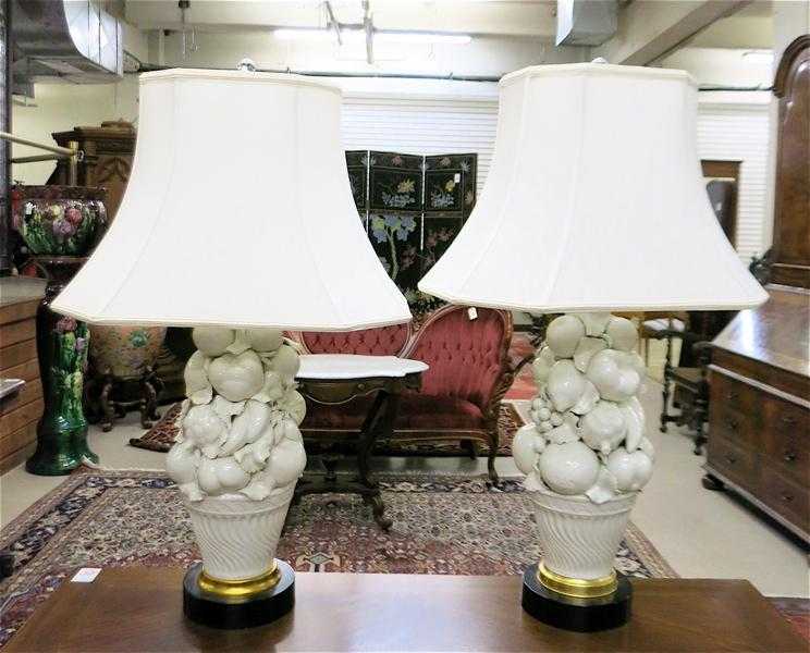 Appraisal: PAIR OF WHITE ITALIAN CERAMIC TABLE LAMPS depicting a still-life