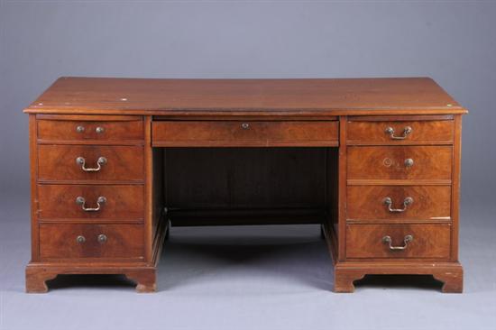 Appraisal: GEORGIAN STYLE DOUBLE-PEDESTAL DESK th century mahogany Molded-edge rectangular top