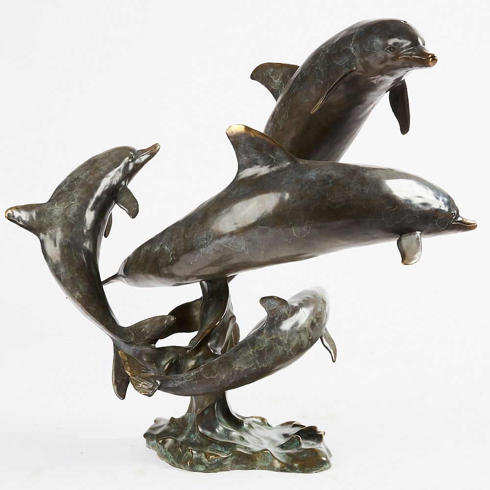 Appraisal: Family of Dolphins Bronze Sculpture Bronze sculpture depicting a family