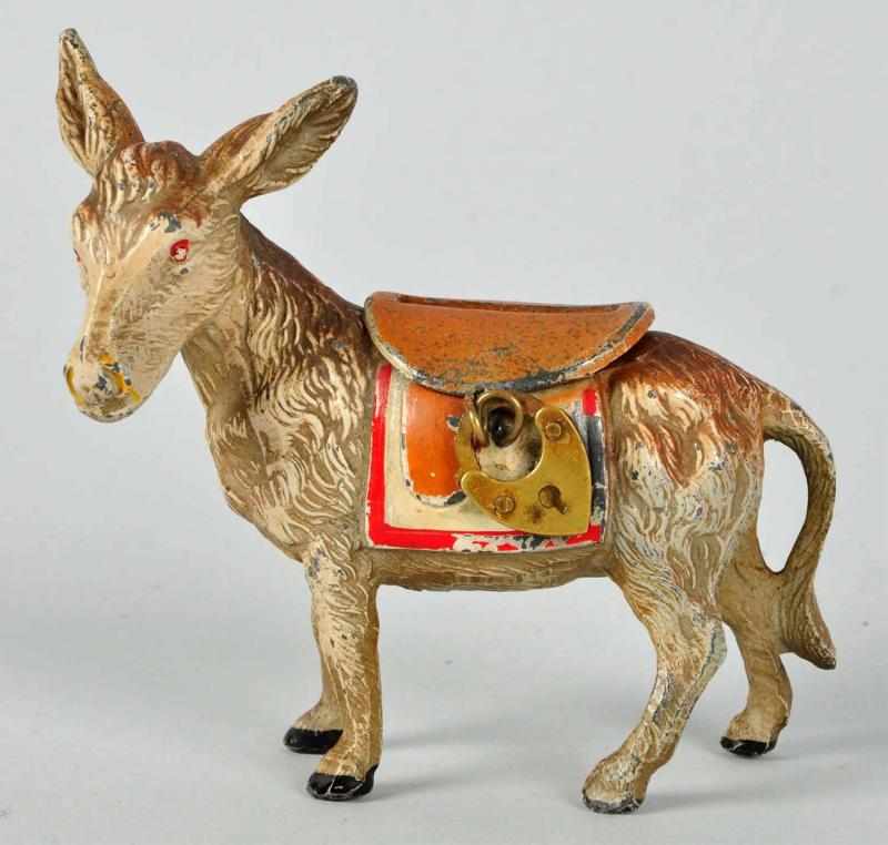 Appraisal: German Lead Donkey Still Bank Description With hinged saddle Condition