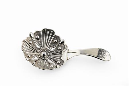 Appraisal: A George III caddy spoon J Taylor Birmingham with flower