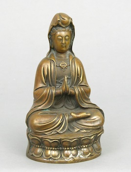 Appraisal: A Bronze Quan Yin ca th Century Seated figure on