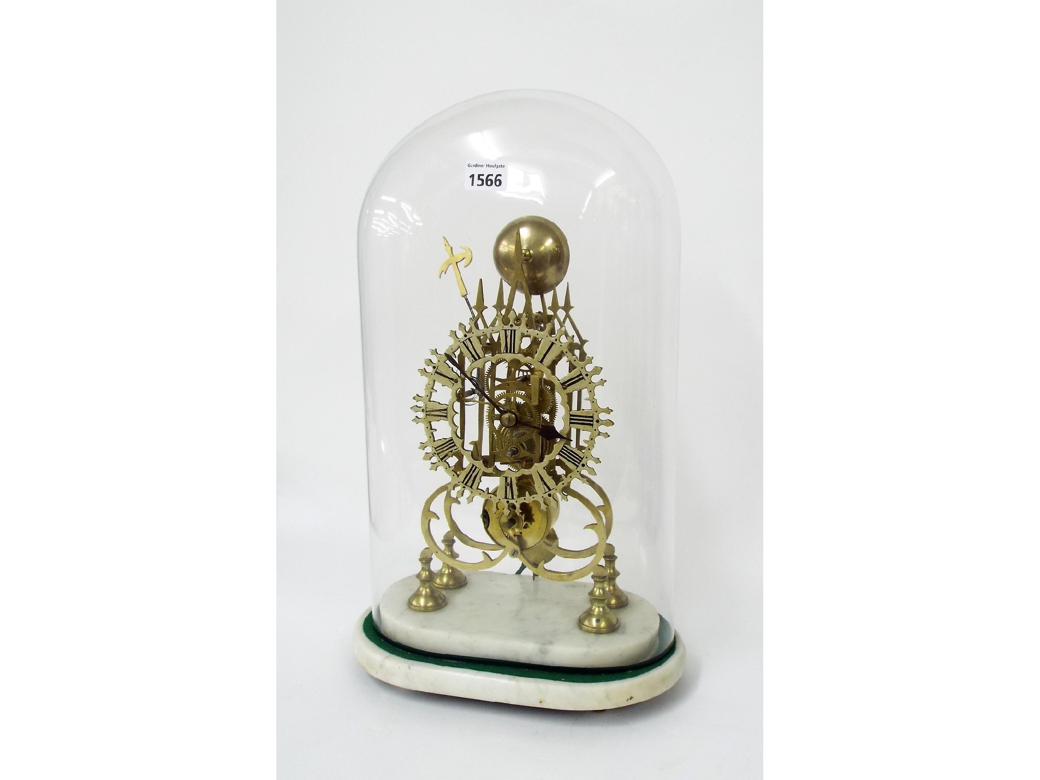 Appraisal: Brass single fusee skeleton clock with passing strike on a