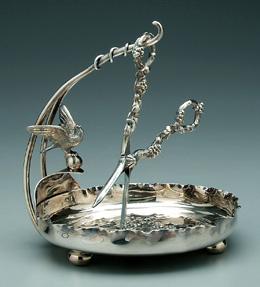 Appraisal: Silver plated grape stand scissors round stand with scalloped border