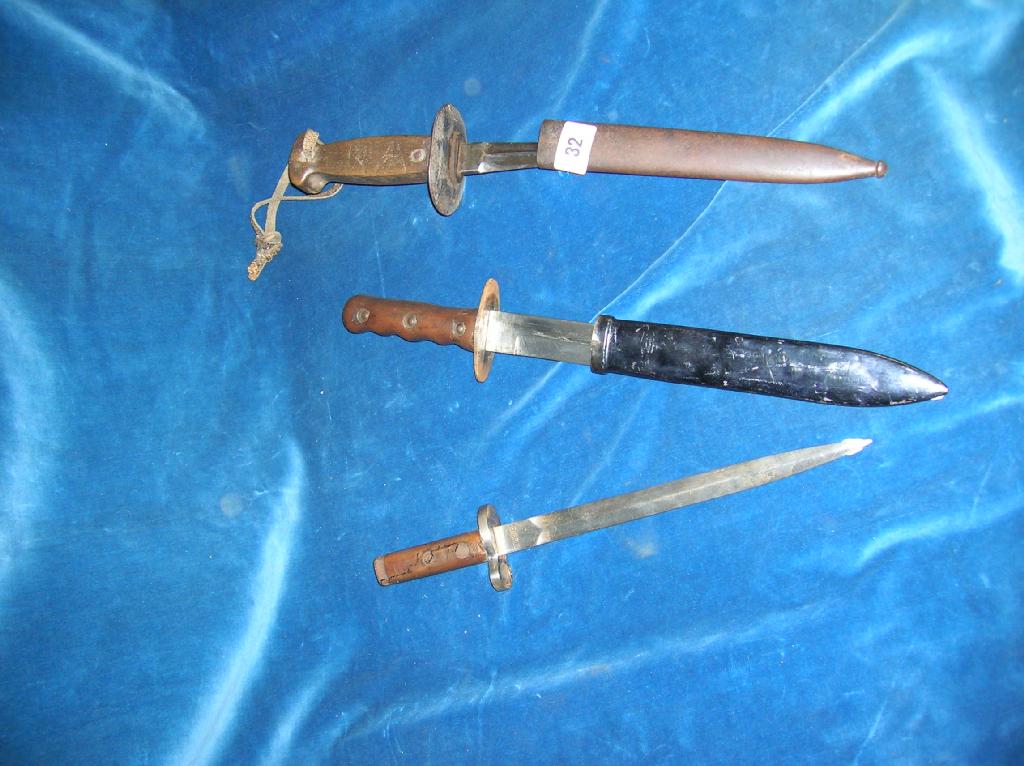 Appraisal: Three assorted military fighting knives Italian Belgian and one converted