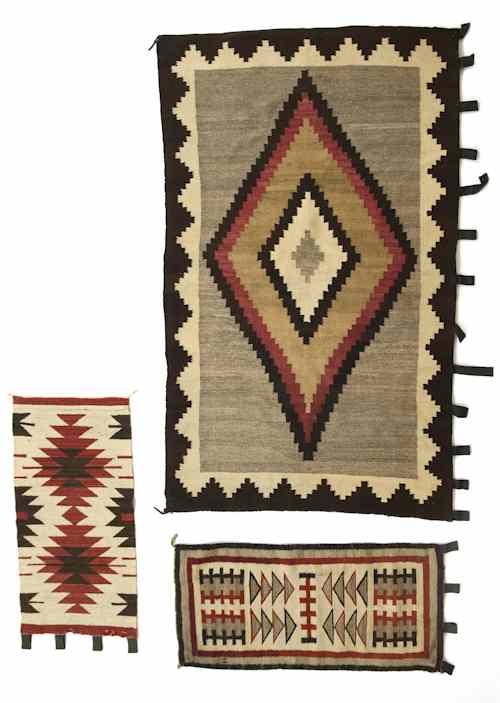 Appraisal: Navajo regional rug ca x together with two small mats