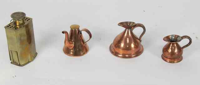 Appraisal: A brass cased carriage lamp two small copper measures and