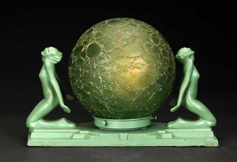 Appraisal: Frankart Nude Cast Metal Lamp with Green Shade Description Circa