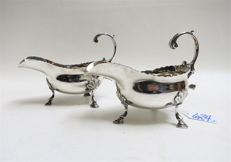 Appraisal: PAIR KING GEORGE III STERLING SILVER SAUCE BOATS each hallmarked