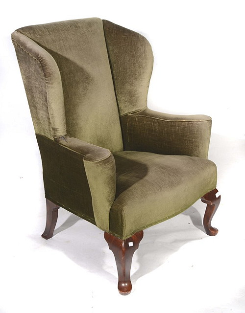 Appraisal: A HOWARD SONS WING ARMCHAIR in the Queen Anne style