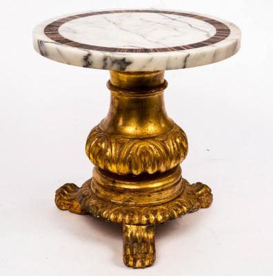 Appraisal: A low marble top table on carved and gilded base