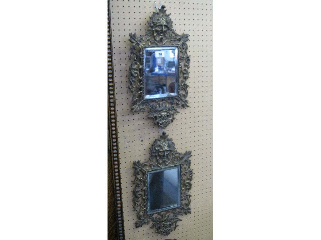 Appraisal: Pair of ornate brass framed mirrors