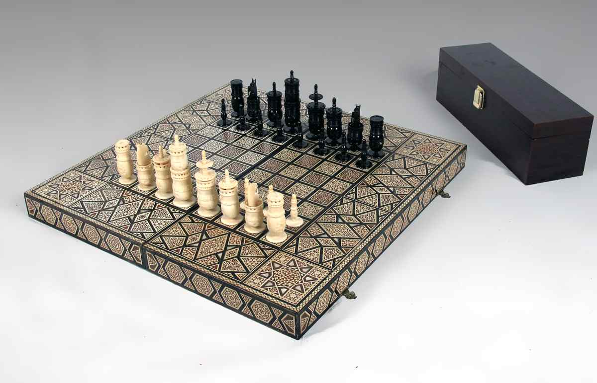 Appraisal: IVORY CHESS SET WITH INLAID BOX Complete carved ivory chess