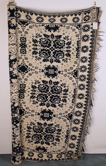 Appraisal: An Jacquard Woven Coverlet dark blue and ivory with the