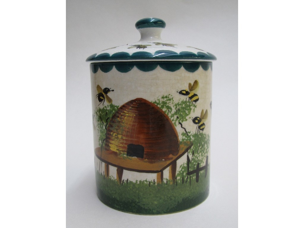 Appraisal: A Wemyss honey pot and cover painted with bees and