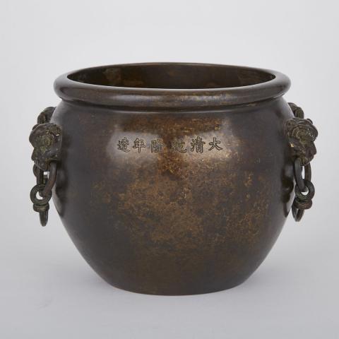 Appraisal: A Large Finely Cast Bronze Censer with Four Lion Mask