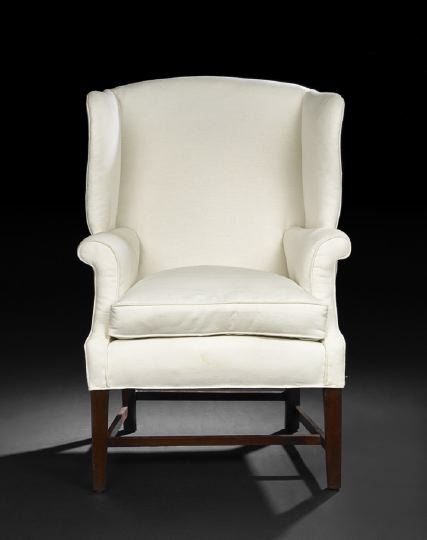 Appraisal: George III-Style Mahogany and Upholstered Wing Chair the domed and