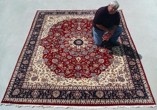 Appraisal: HAND WOVEN PERSIAN CARPET Measures ' '' x ' ''