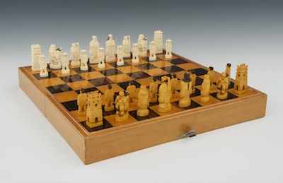 Appraisal: A Chinese Carved Ivory Chess Set with Wood Marquetry Game