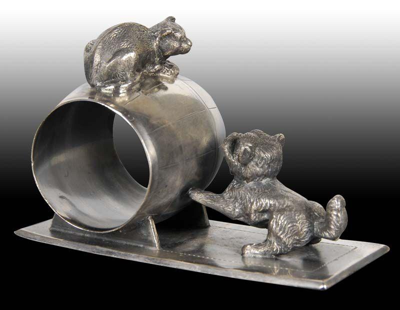 Appraisal: Fighting Dog Cat Figural Napkin Ring Description Marked Charles W