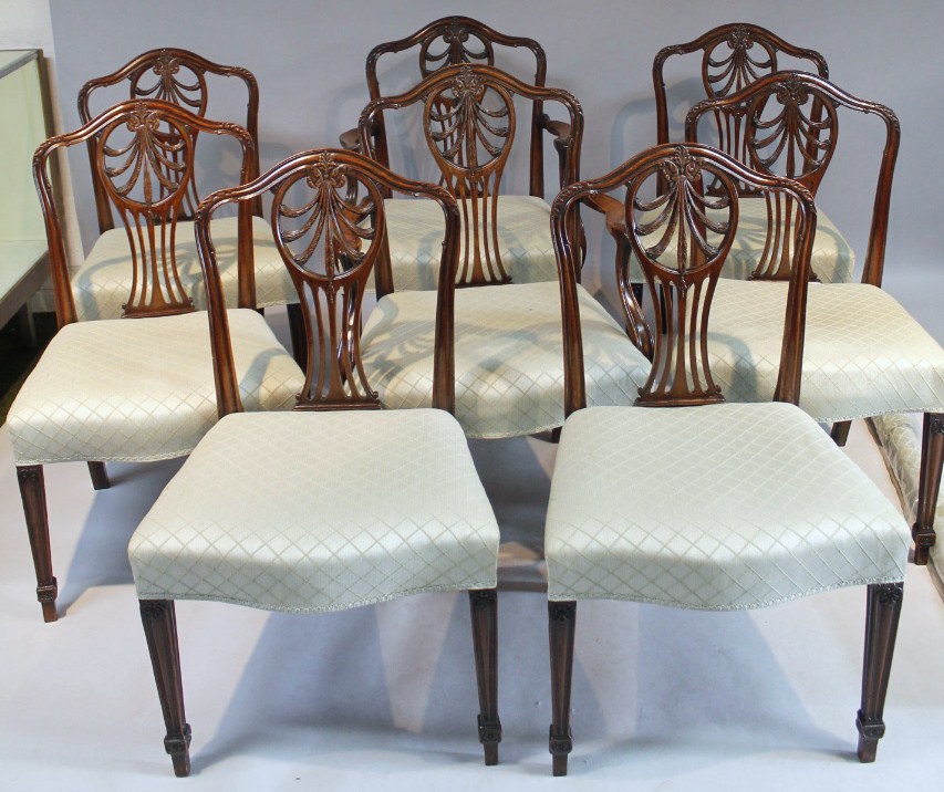 Appraisal: A set of eight Hepplewhite design mahogany framed dining chairs